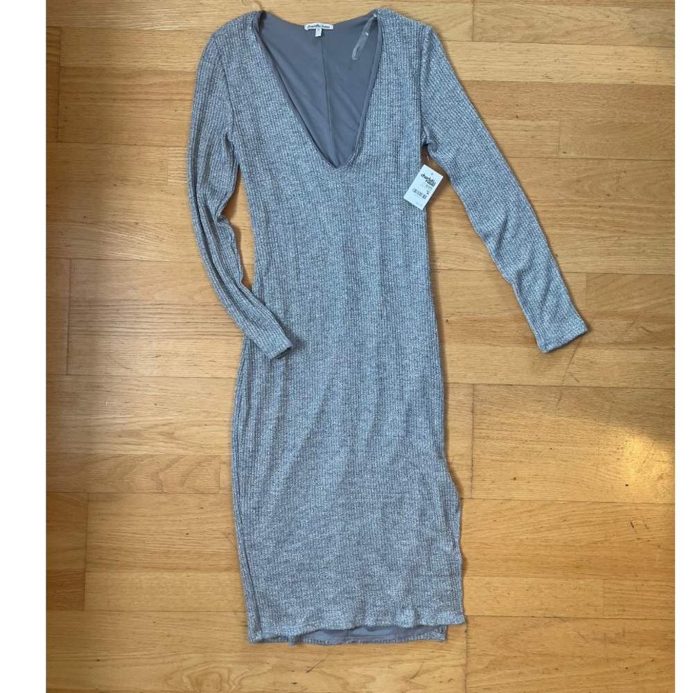 Brand new long sleeve silver/grey dress.